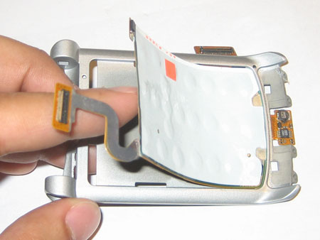 Stick the keyboard circuit to the plastic housing